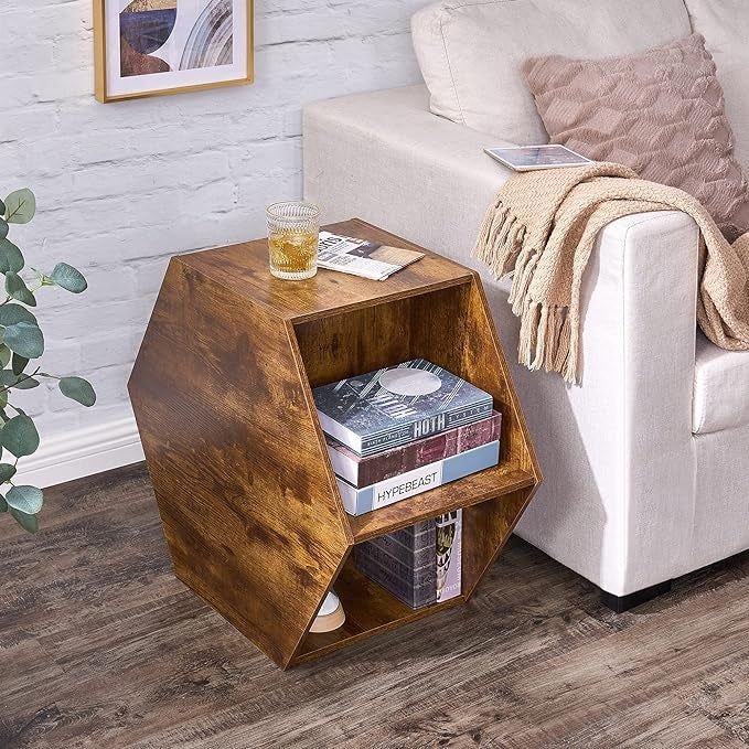 The hexagonal table propped on its side, serving as a functional end table, showcasing its flexible design.