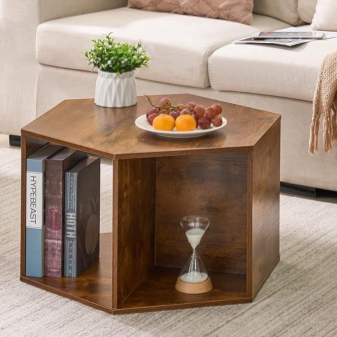A hexagonal coffee table topped with a plant and a plate of fruit, adding a fresh, stylish look to the space.