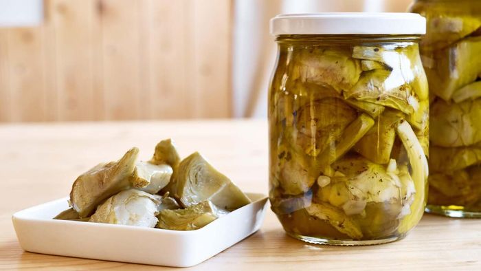 Consider enhancing your rice by incorporating artichoke marinade into the mix.