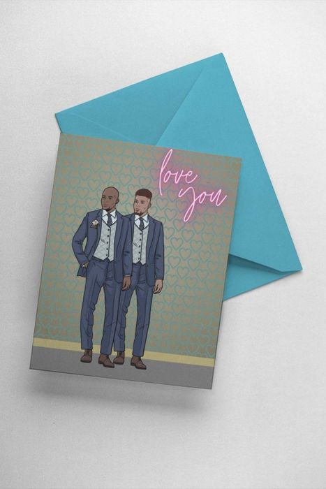 A card featuring two people in suits with the words 'love you' in neon in the corner.