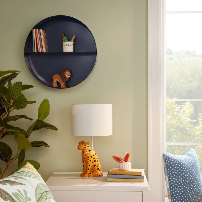 The cheetah lamp paired with a crisp white lampshade.