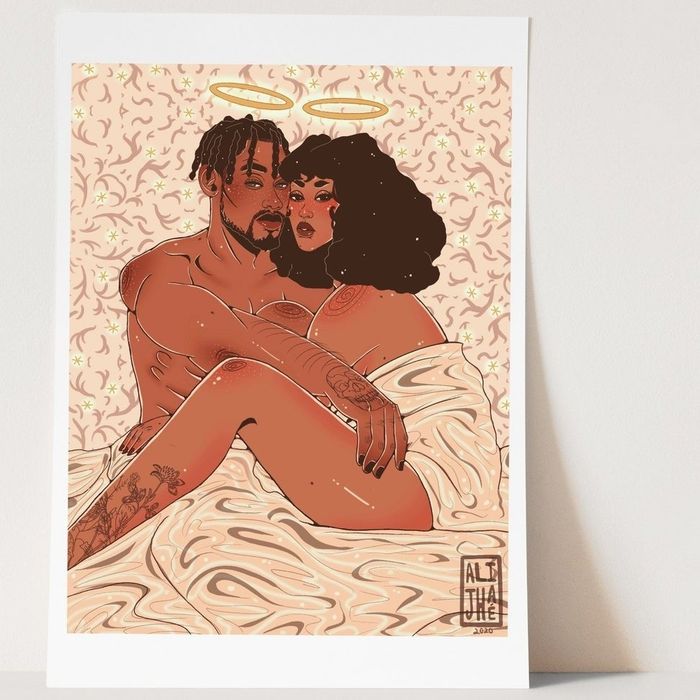 A couple with halos, cuddling closely together beneath soft sheets.