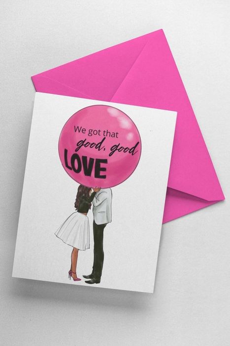 A card featuring two people in a loving embrace, with their faces concealed by a balloon that reads, 