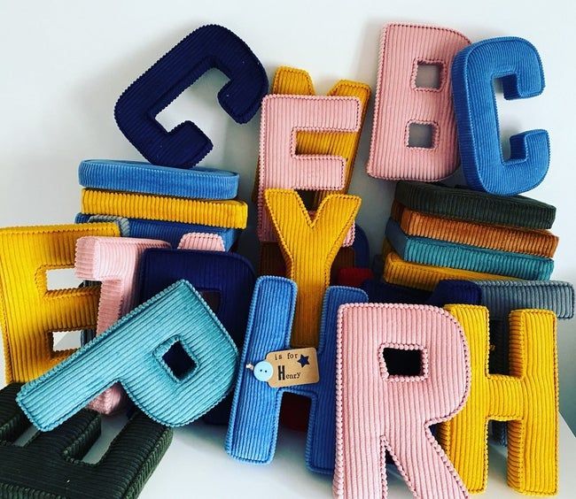 Corduroy letter pillows available in a variety of colors.