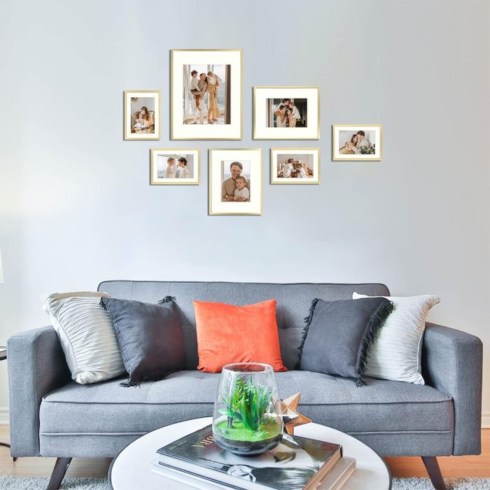 A set of seven gold photo frames.