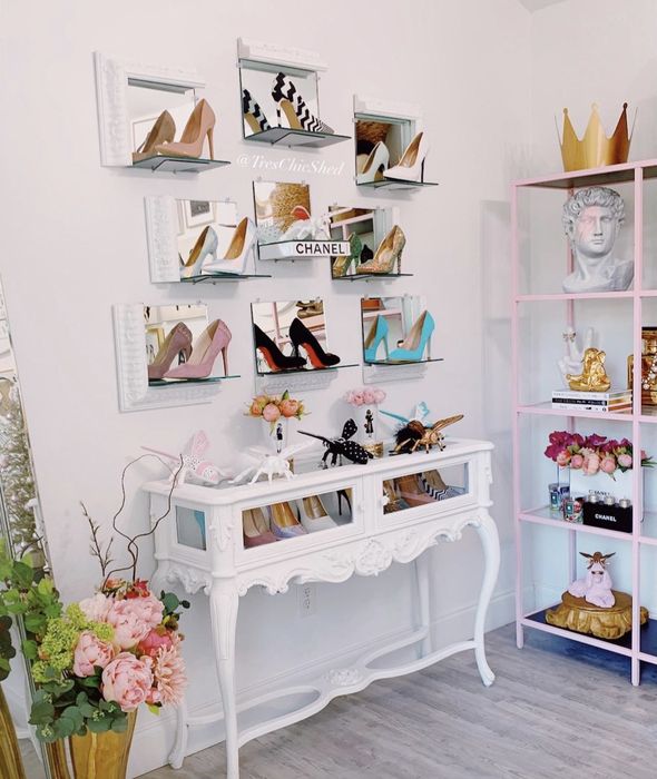A reviewer’s photo showing shoes neatly displayed on shelves.