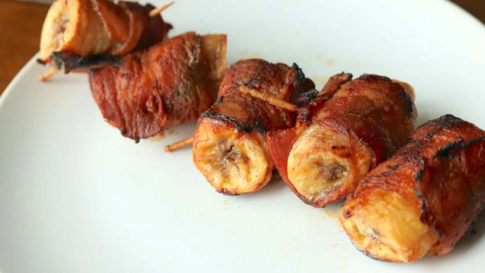 Bacon makes everything better – I’m certainly not the first to claim that. The combination of salty, smoky, crispy goodness is tough to resist. But, it turns out bacon has met its match. Bananas, along with their relatives, are just as capable of improving anything. Luckily, these two are not adversaries. When paired together, they create an incredible snack that’s easily the best I’ve had all week. Air-fried bacon-wrapped banana bites blend harmonious flavors, and I would happily serve them at any gathering.