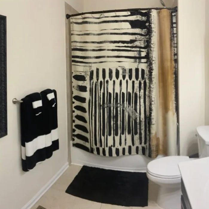 A reviewer’s shower curtain that adds elegance and perfectly complements existing decor.
