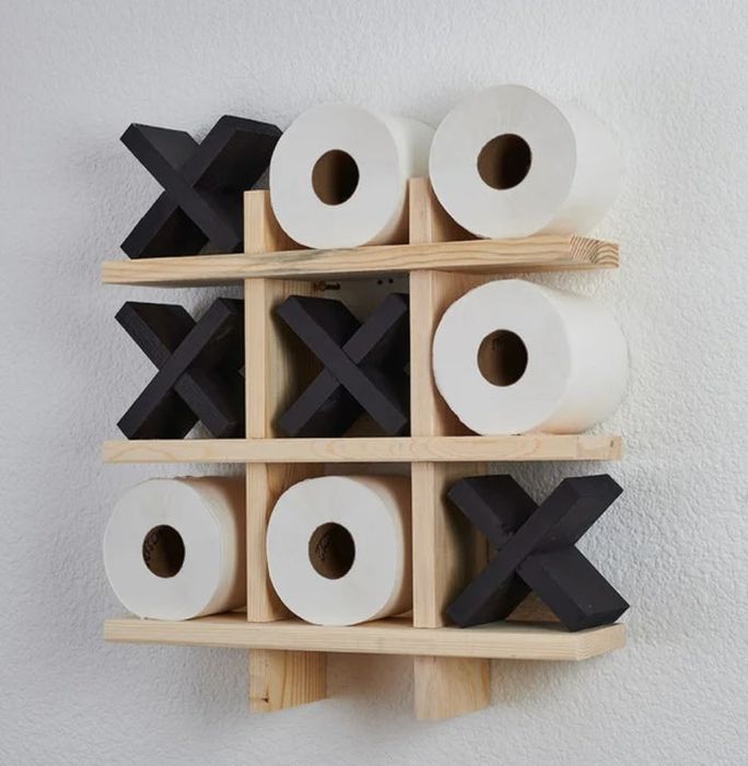 A Tic-Tac-Toe toilet paper holder that makes a playful addition to your bathroom.