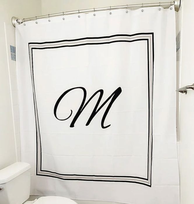 A monogrammed shower curtain that brings a luxurious hotel feel to your bathroom.