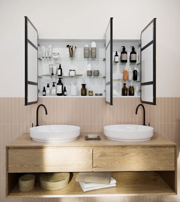 An open medicine cabinet showcasing neat organization and easy access to essentials.