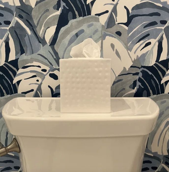 A reviewer’s elegant white hammered tissue box holder, adding a refined look to any space.