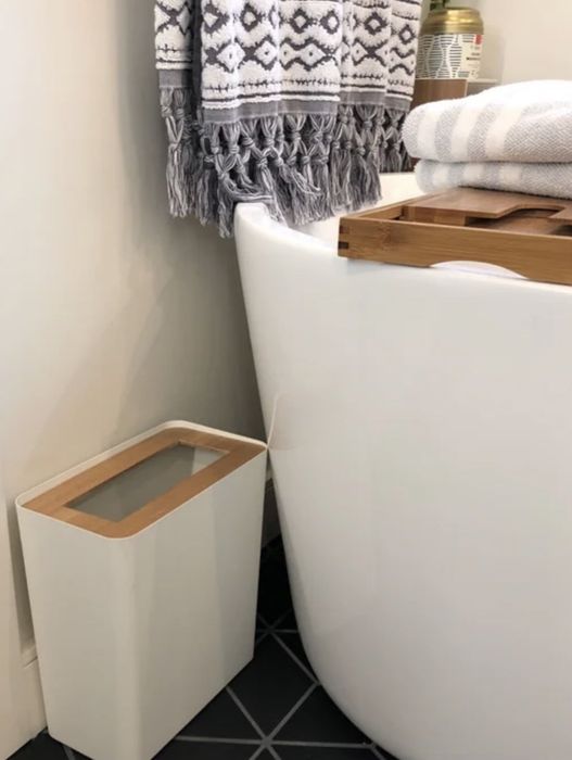 A reviewer’s bathroom trash can