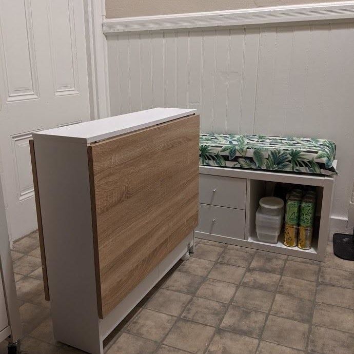 A folded-up version of the table, compact and easy to store.