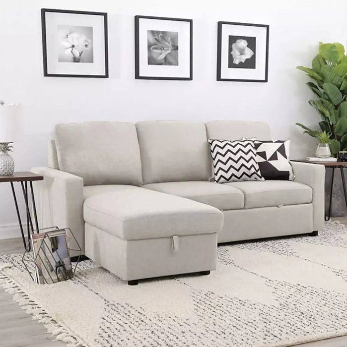 A sectional in sand, providing a fresh and neutral aesthetic to your living area.