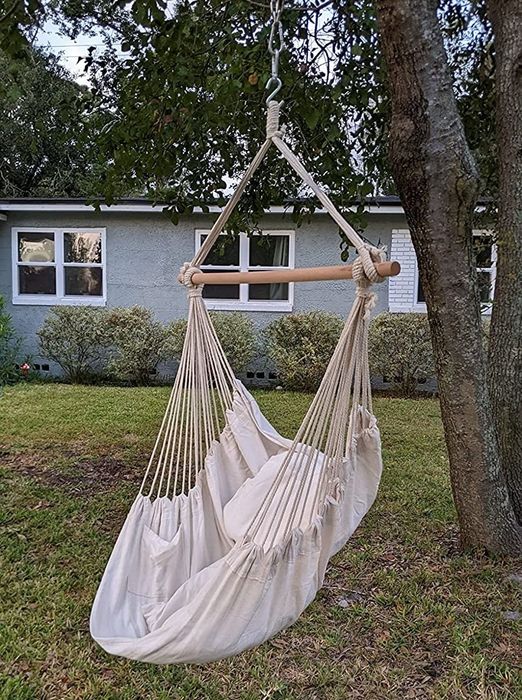 A reviewer’s hammock hanging gracefully from a tree.