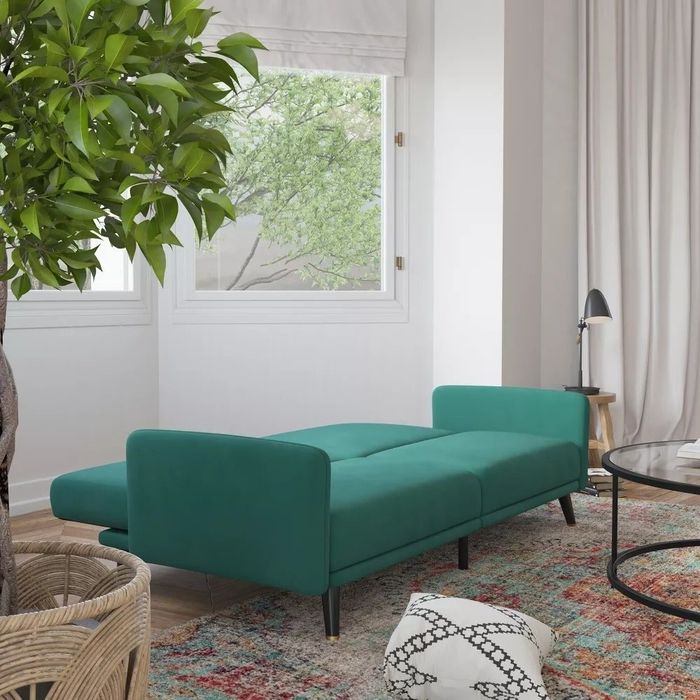 the split-back sofa transformed into a bed