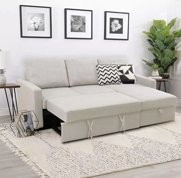 The same sectional in sand, easily transformed into a bed for added convenience and comfort.