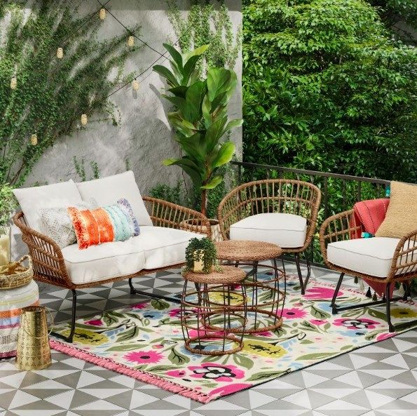 The loveseat shown next to matching chairs.