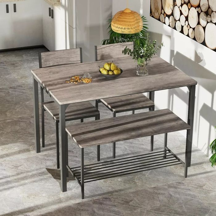 The grey table set placed in a cozy kitchen setting.
