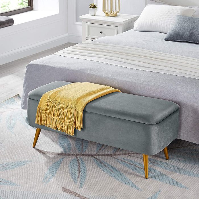 The grey velvet storage bench.