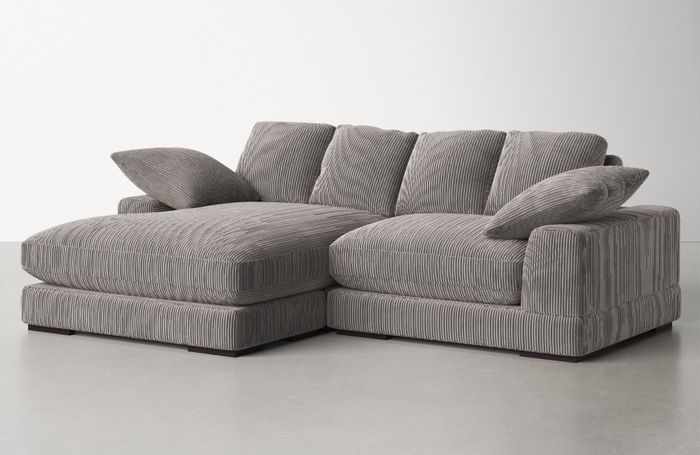 A grey corduroy sectional.