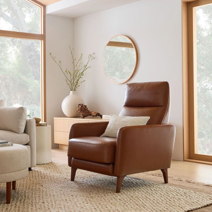The leather recliner displayed in an upright position