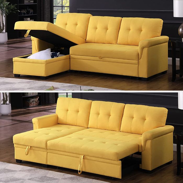 A yellow sectional displayed both as a sofa and a bed.