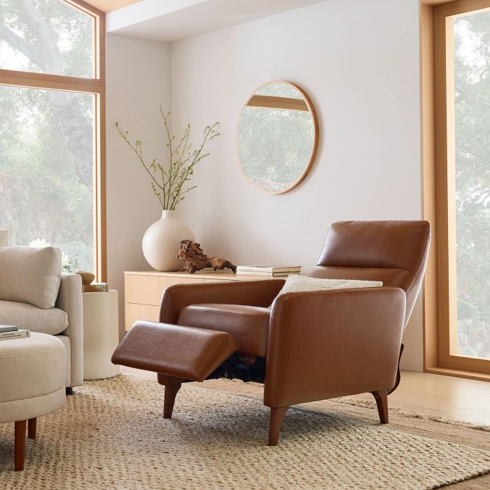 The leather recliner showcased in a reclined position