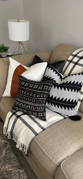 A reviewer's couch with the pillows arranged beautifully on it.