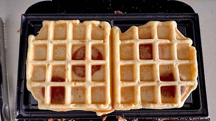 Waffle filled with cookies cooked in a waffle maker