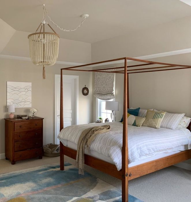 The light fixture positioned in another reviewer's bedroom, creating a chic ambiance.