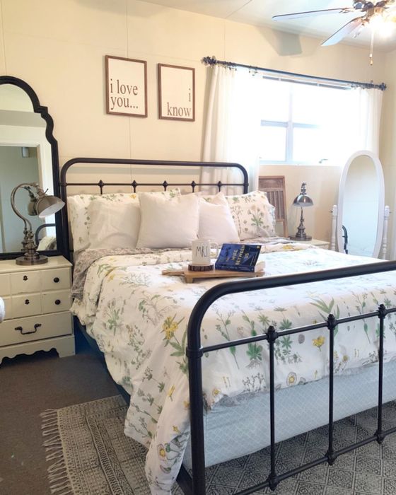 A reviewer's photo features the duvet set placed on a bed in a cozy bedroom.