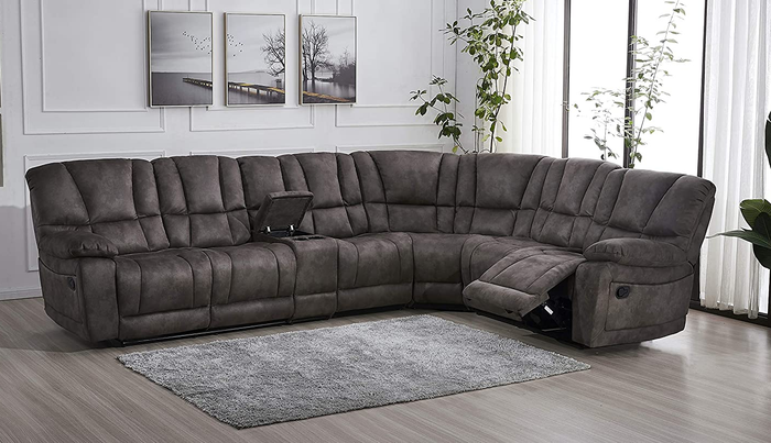A cozy lifestyle shot of a gray microfiber reclining sofa that promises ultimate comfort.