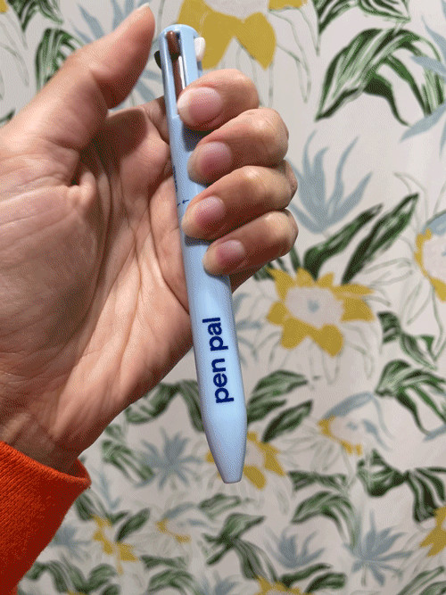 A GIF of Jasmin demonstrating the lip liner feature of the Pen Pal.