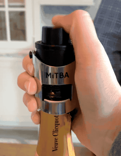 A gif showing a Mytour editor pressing a button on top of the device with their thumb.