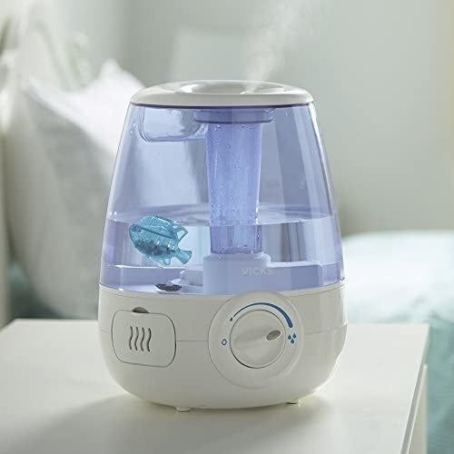 A humidifier with the fish-shaped cleaner floating inside.