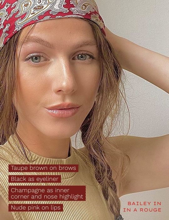 A model showcasing the Pen Pal in a rich rouge shade.