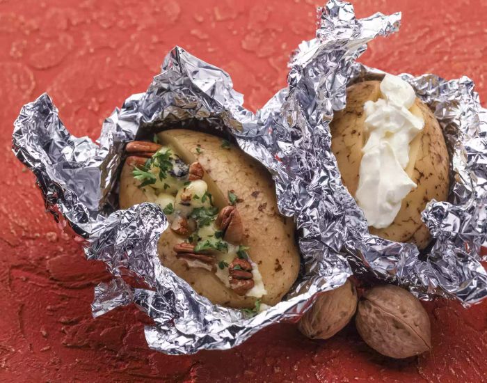 Baked potatoes wrapped in foil