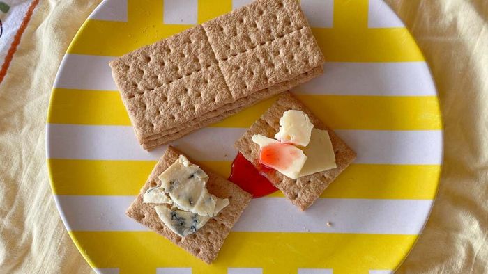 Place Fancy Cheese on Graham Crackers