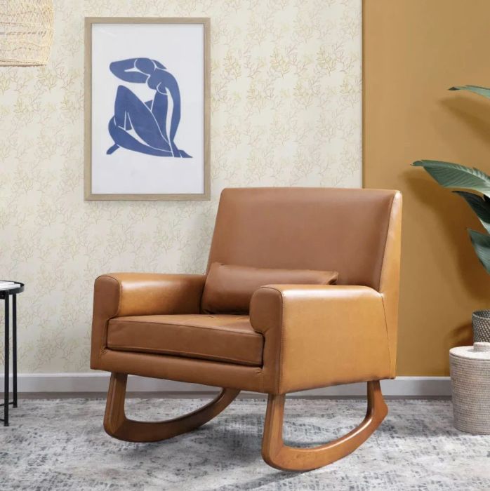 The rocker featuring a lumbar support pillow