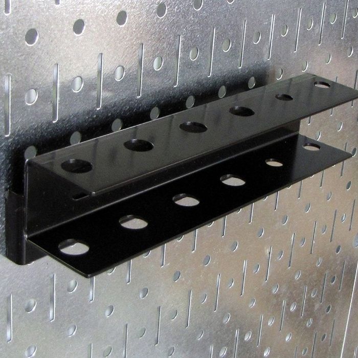 A close-up view of the solid steel pegboard