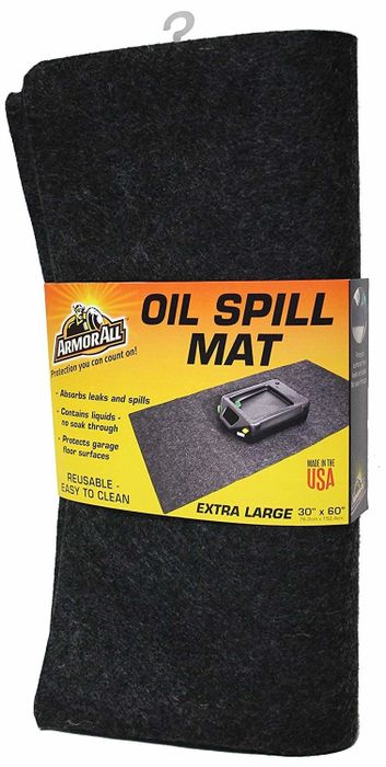 a black oil spill protection mat