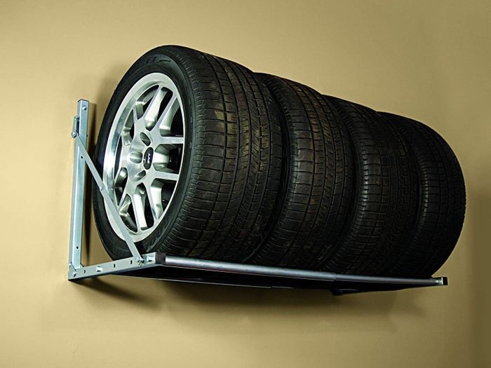 four straps on the robust metal tire rack