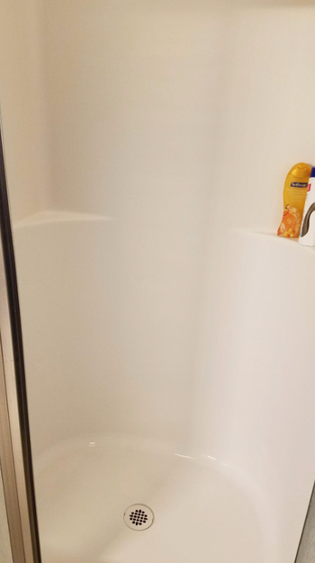 The same shower now looking spotless and brand new