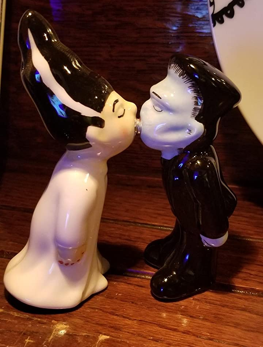 A close-up of the kissing Frankenstein's monster and bride salt and pepper shakers