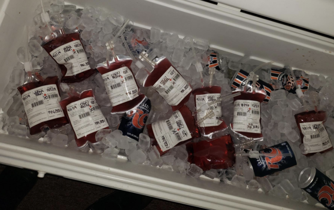 the blood bag drink holders placed in a cooler with other beverages