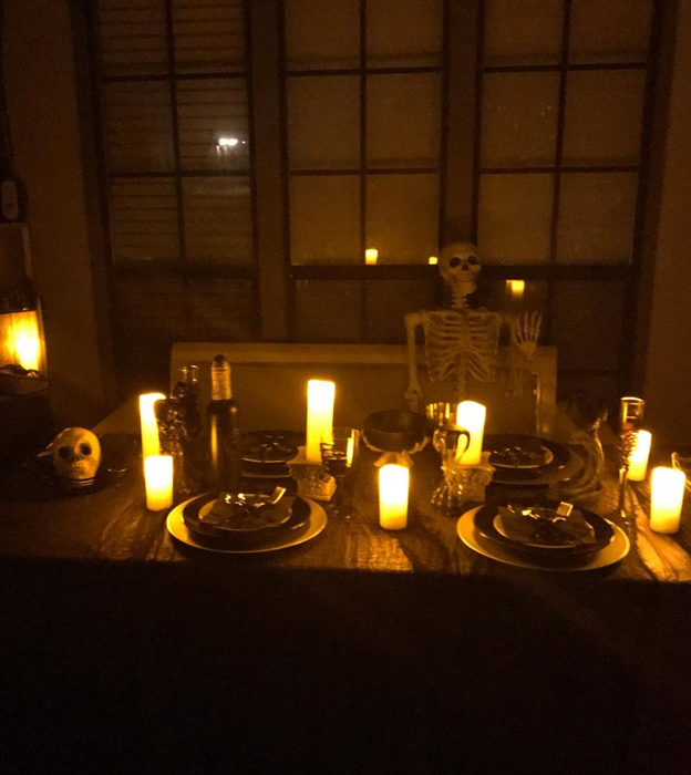 The same reviewer's Halloween table, this time showcasing the flameless candles at night