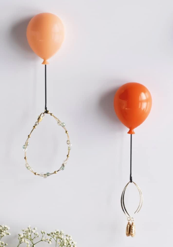 the hooks displaying rings and bracelets