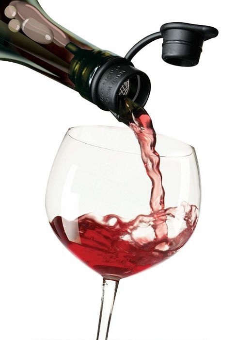 Wine flowing perfectly from the stopper without spills or mess.